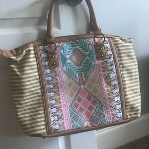 Women’s khaki Aztec print purse